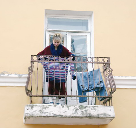 В некоторых домах города запрещено стеклить балконы