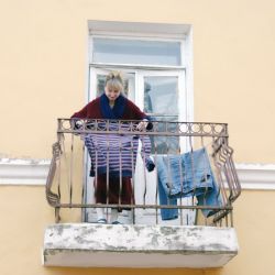 В некоторых домах города запрещено стеклить балконы